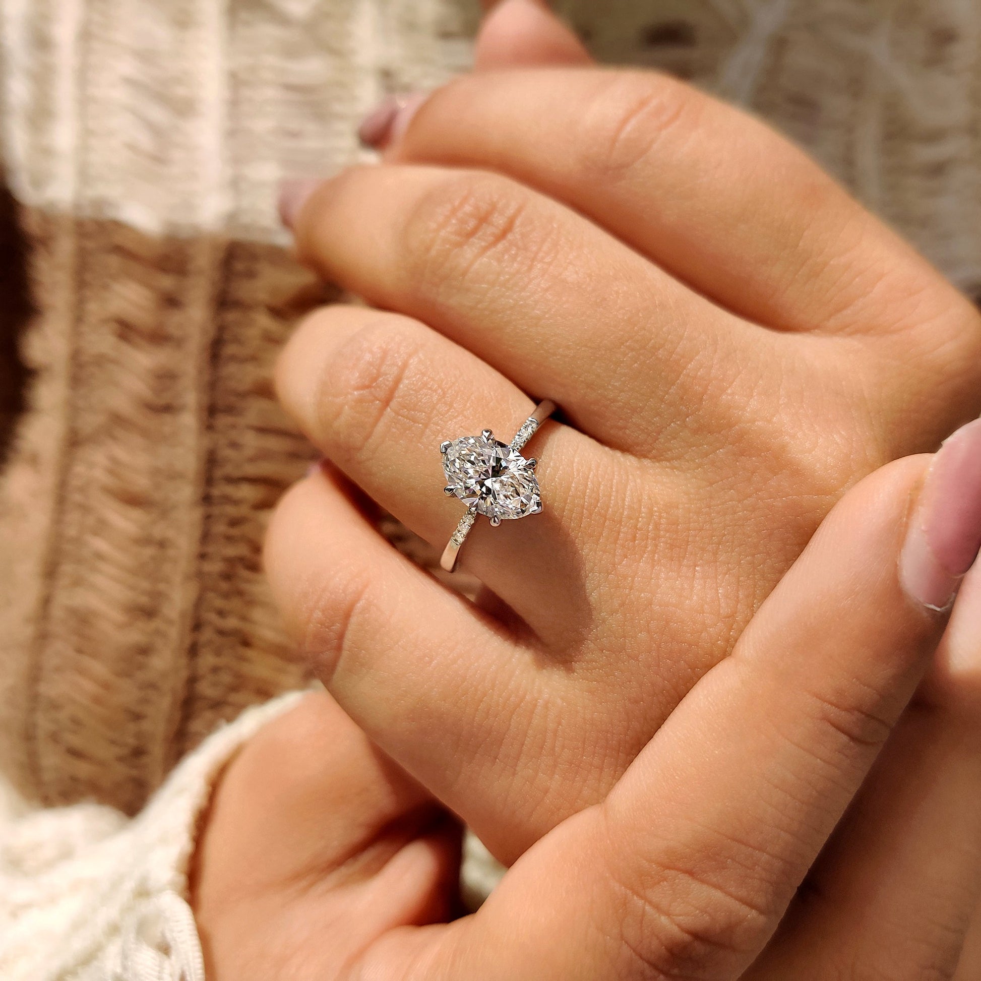 Oval Cut Diamond Engagement Ring With Pave Setting