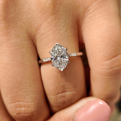 Oval Cut Diamond Engagement Ring With Pave Setting