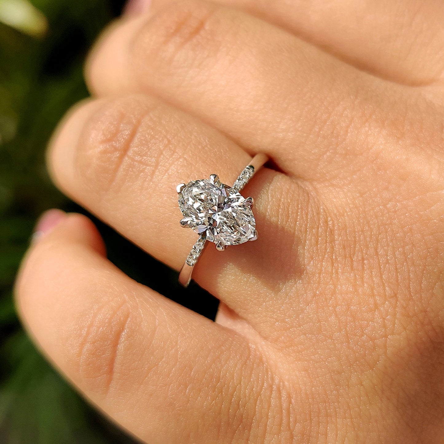 Oval Cut Diamond Engagement Ring With Pave Setting