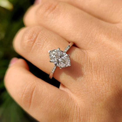 Oval Cut Diamond Engagement Ring With Pave Setting