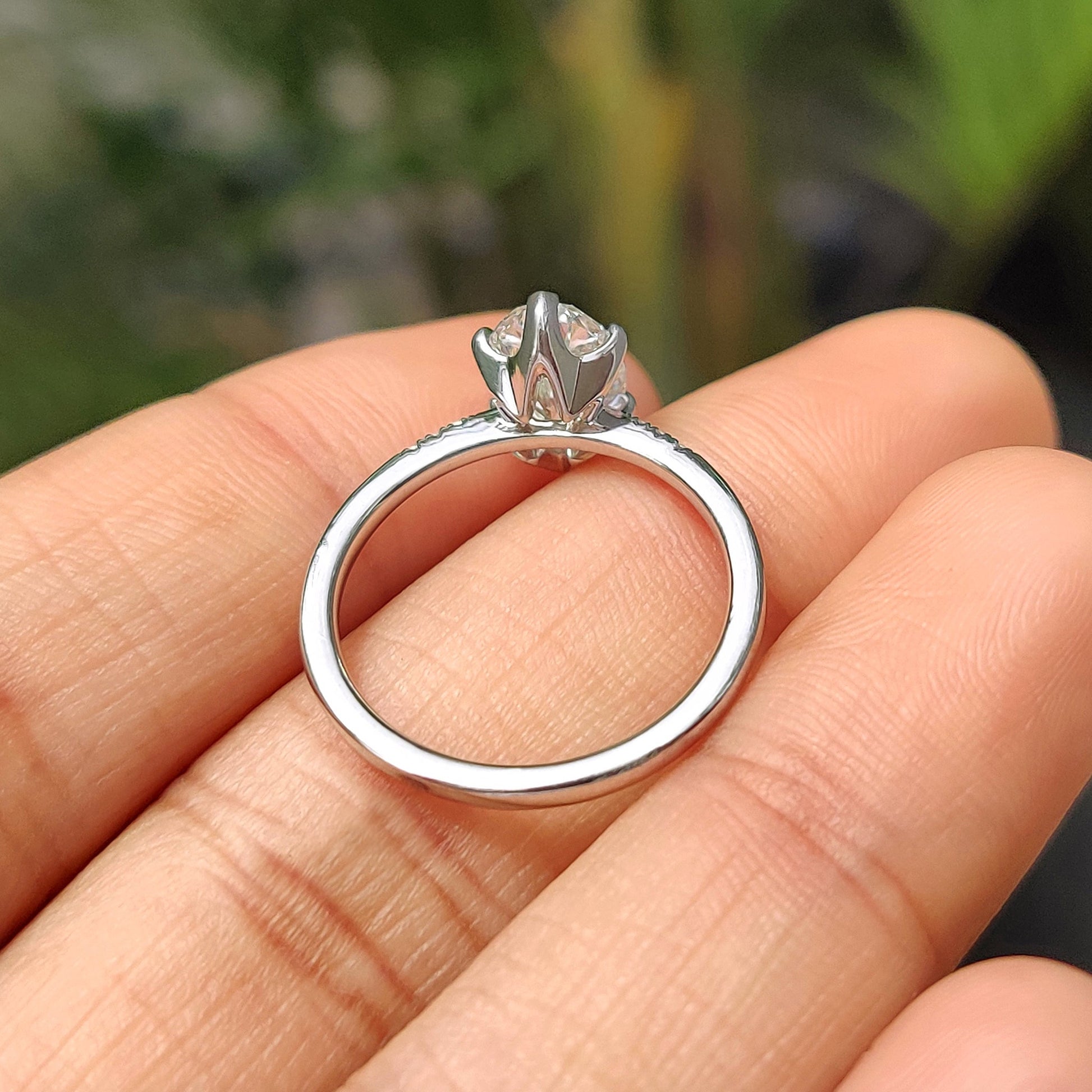 Oval Cut Diamond Engagement Ring With Pave Setting