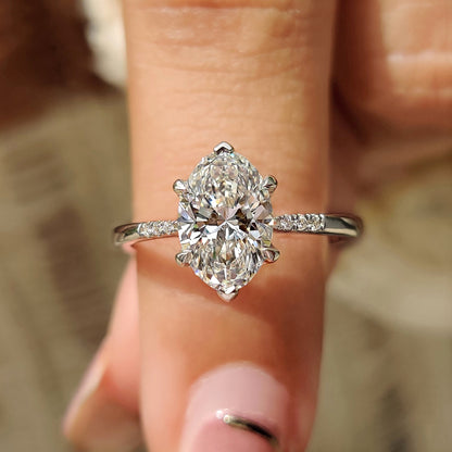 Oval Cut Diamond Engagement Ring With Pave Setting