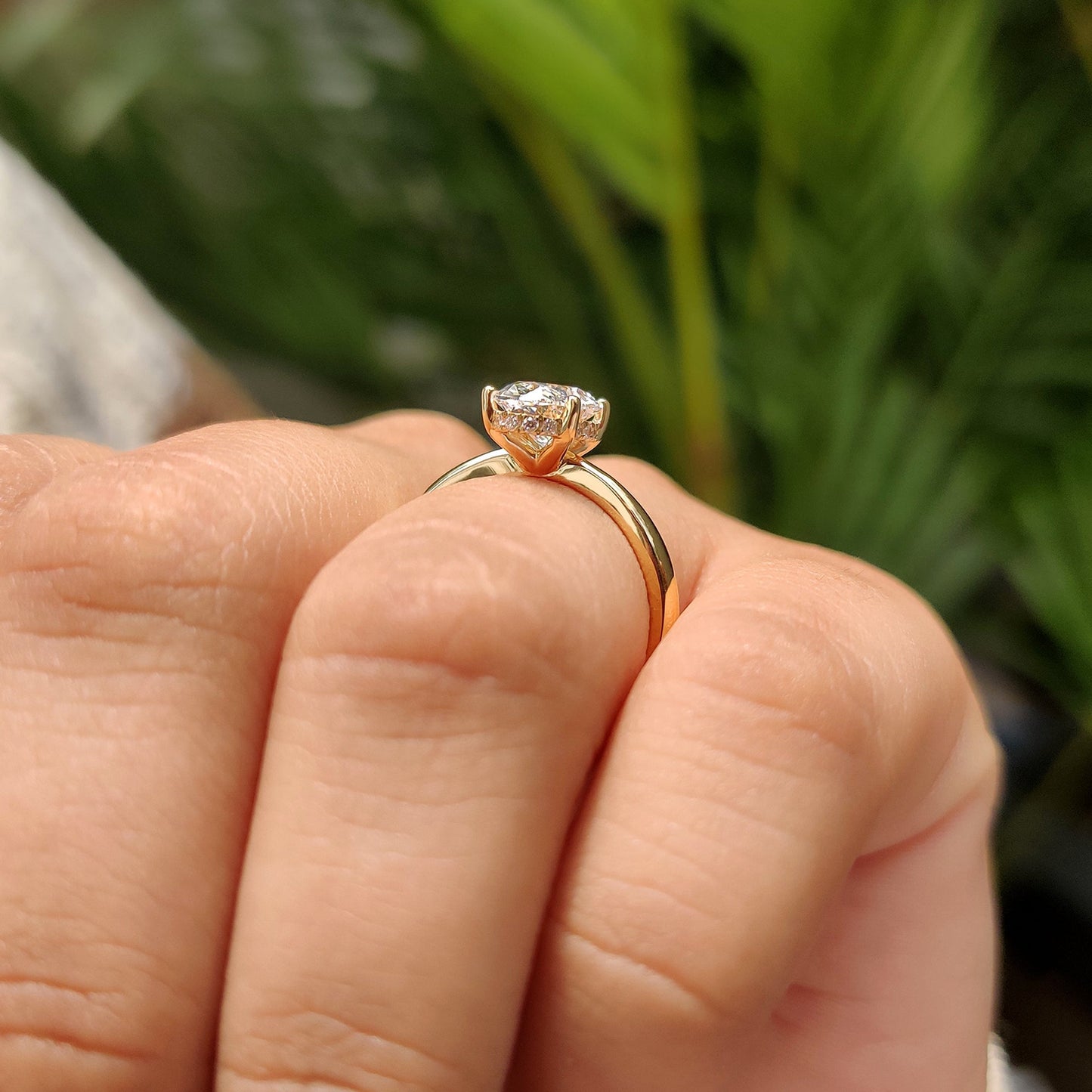 Oval Cut Engagement Ring In Hidden Halo Style