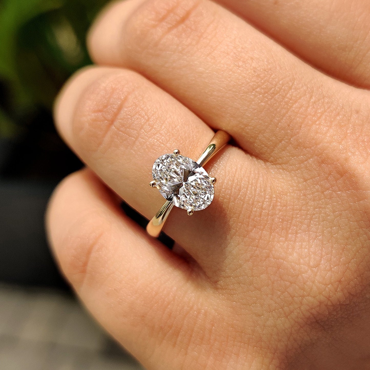 Oval Cut Engagement Ring In Hidden Halo Style