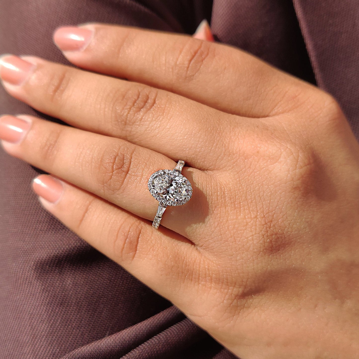 Oval Cut Engagement Ring With Tapered Baguette Side Stone