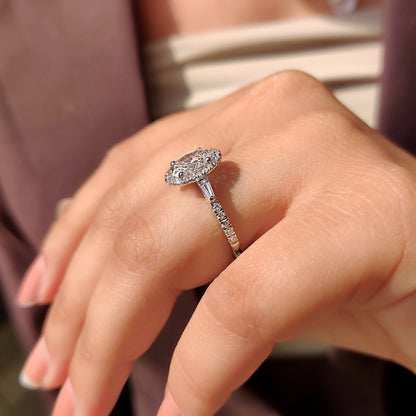 Oval Cut Engagement Ring With Tapered Baguette Side Stone