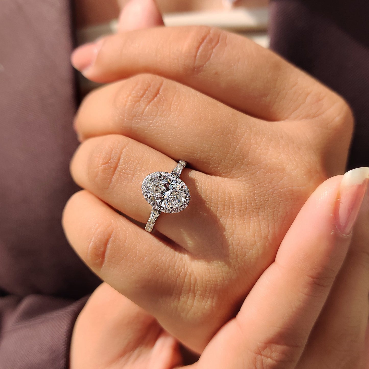 Oval Cut Engagement Ring With Tapered Baguette Side Stone