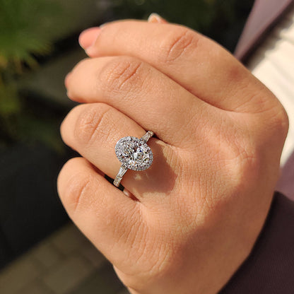 Oval Cut Engagement Ring With Tapered Baguette Side Stone