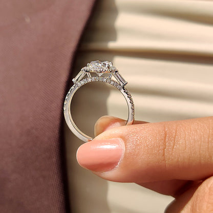 Oval Cut Engagement Ring With Tapered Baguette Side Stone