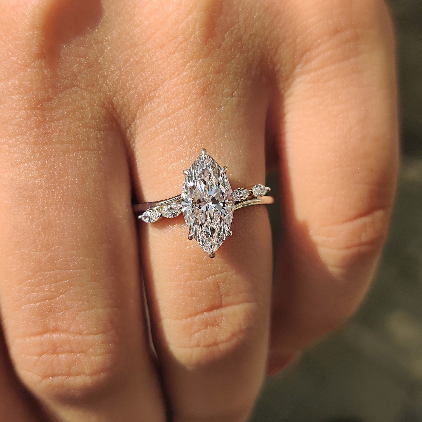 Marquise Cut Diamond Engagement Ring In Hidden Halo Style