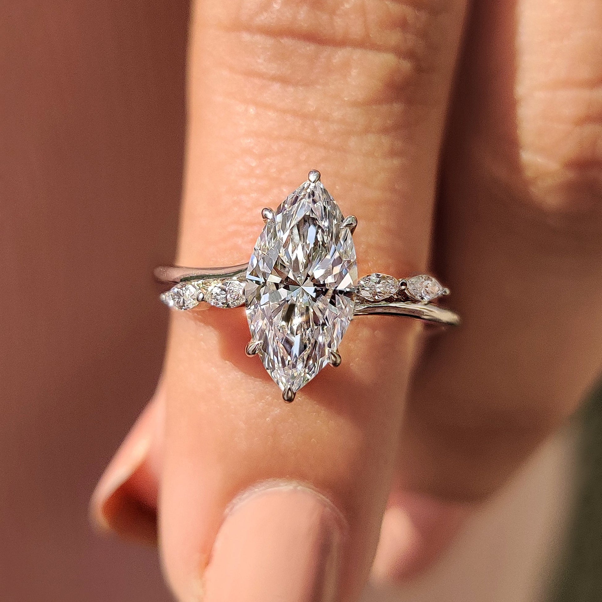 Marquise Cut Diamond Engagement Ring In Hidden Halo Style