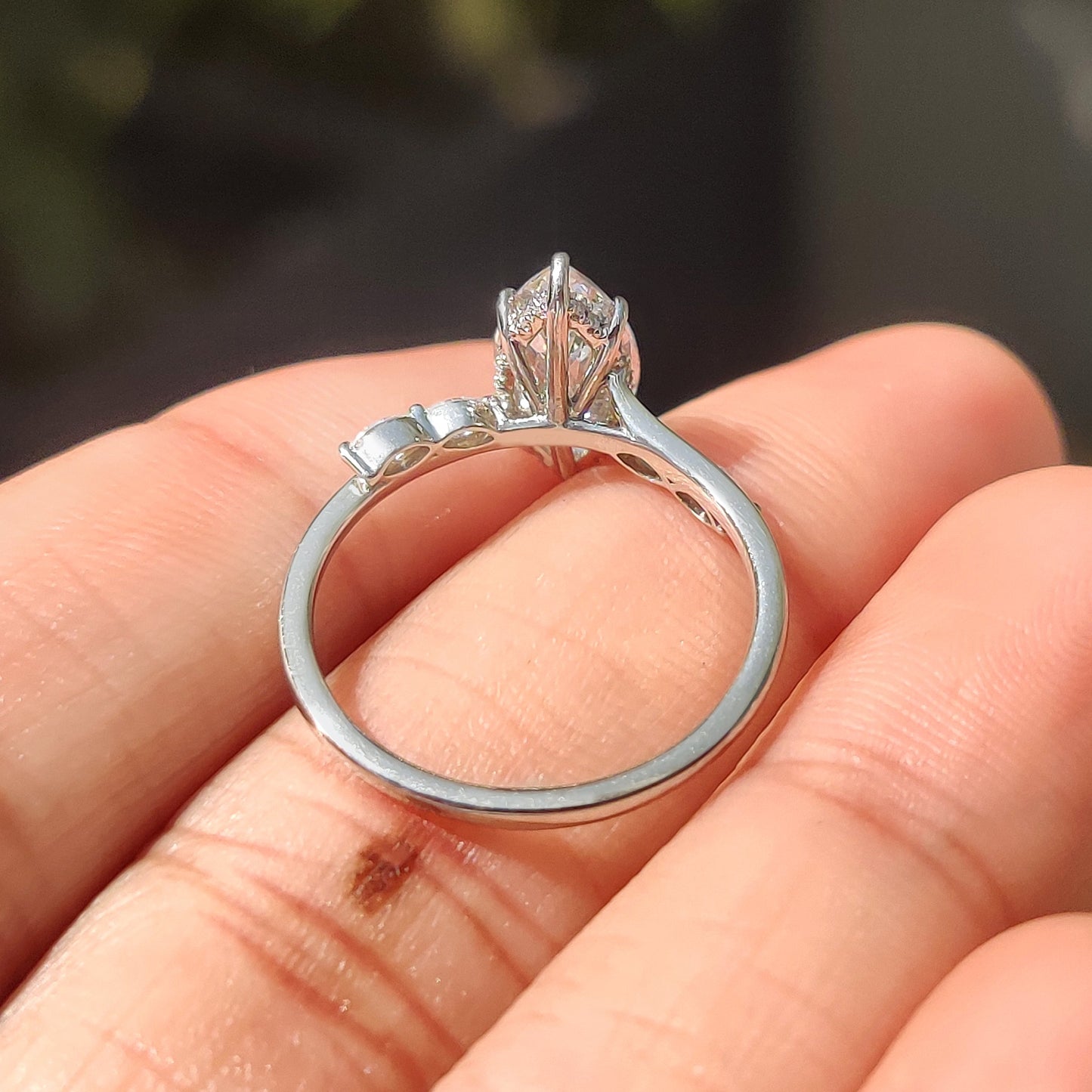 Marquise Cut Diamond Engagement Ring In Hidden Halo Style