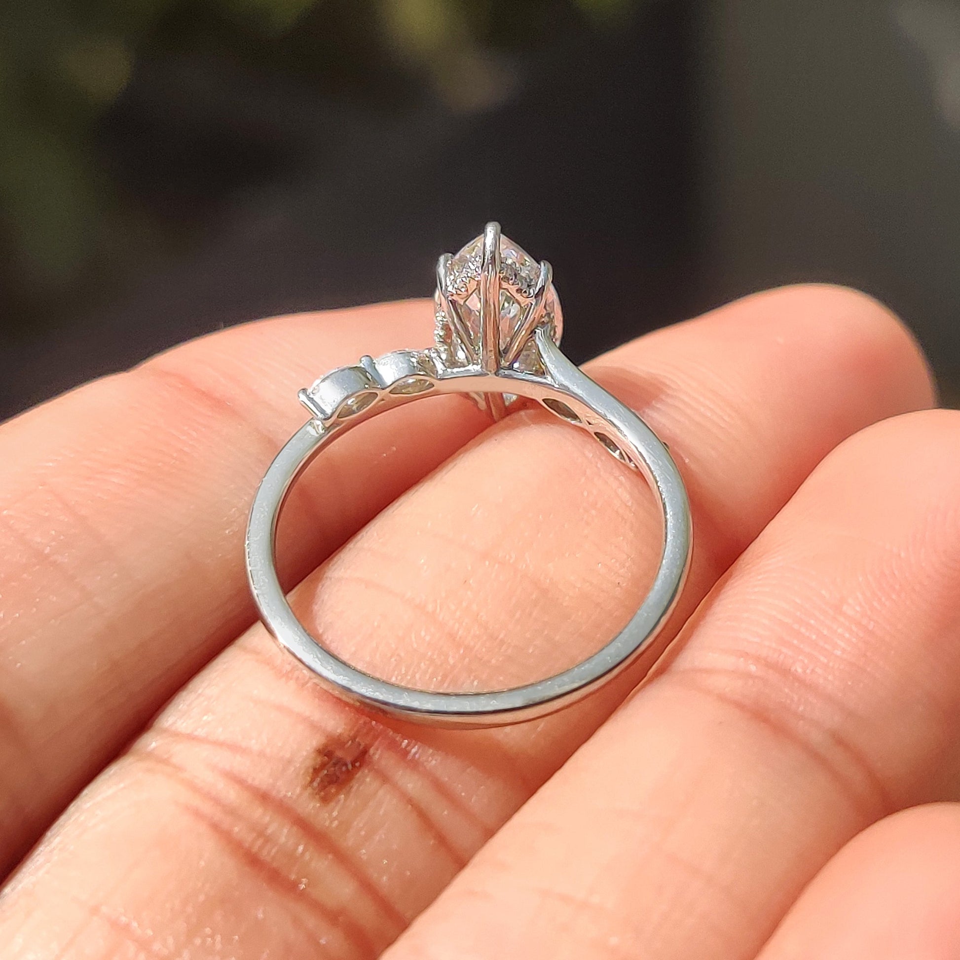 Marquise Cut Diamond Engagement Ring In Hidden Halo Style