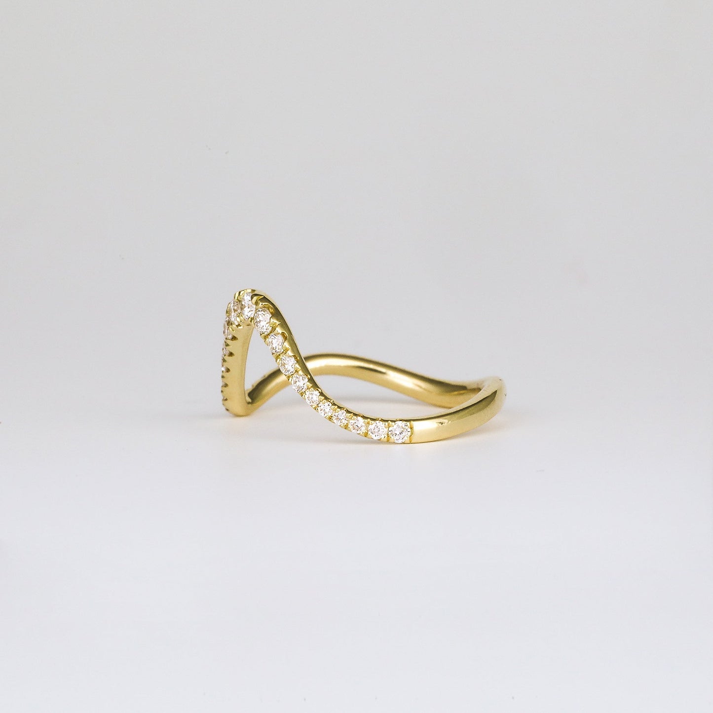 0.28 TCW Round Shaped Wave Moissanite Wedding Band