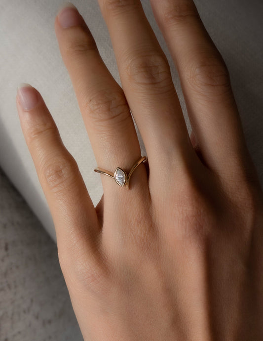 0.45 CT Marquise Moissanite Engagement Ring with Swirl Solitaire & Bezel Minimal Design