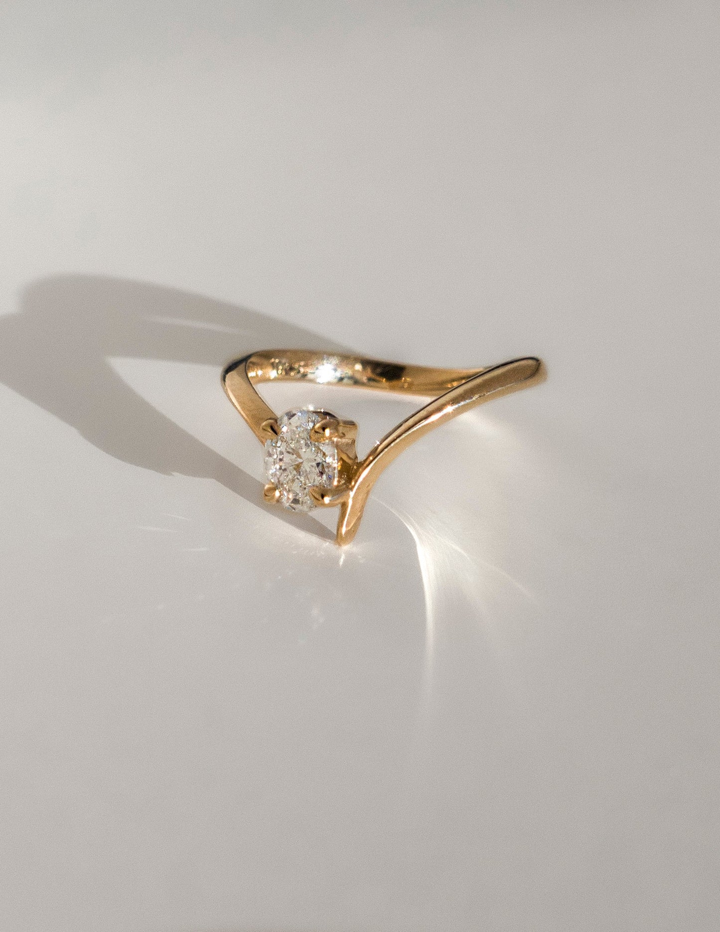 0.45 CT Oval Moissanite Engagement Ring with Swirl Solitaire Minimal Design