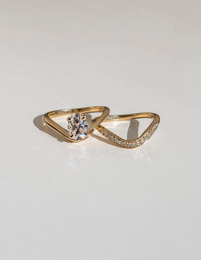 1 CT Oval Cut Solitaire Moissanite Ring With Sunrise Styled Wedding Band