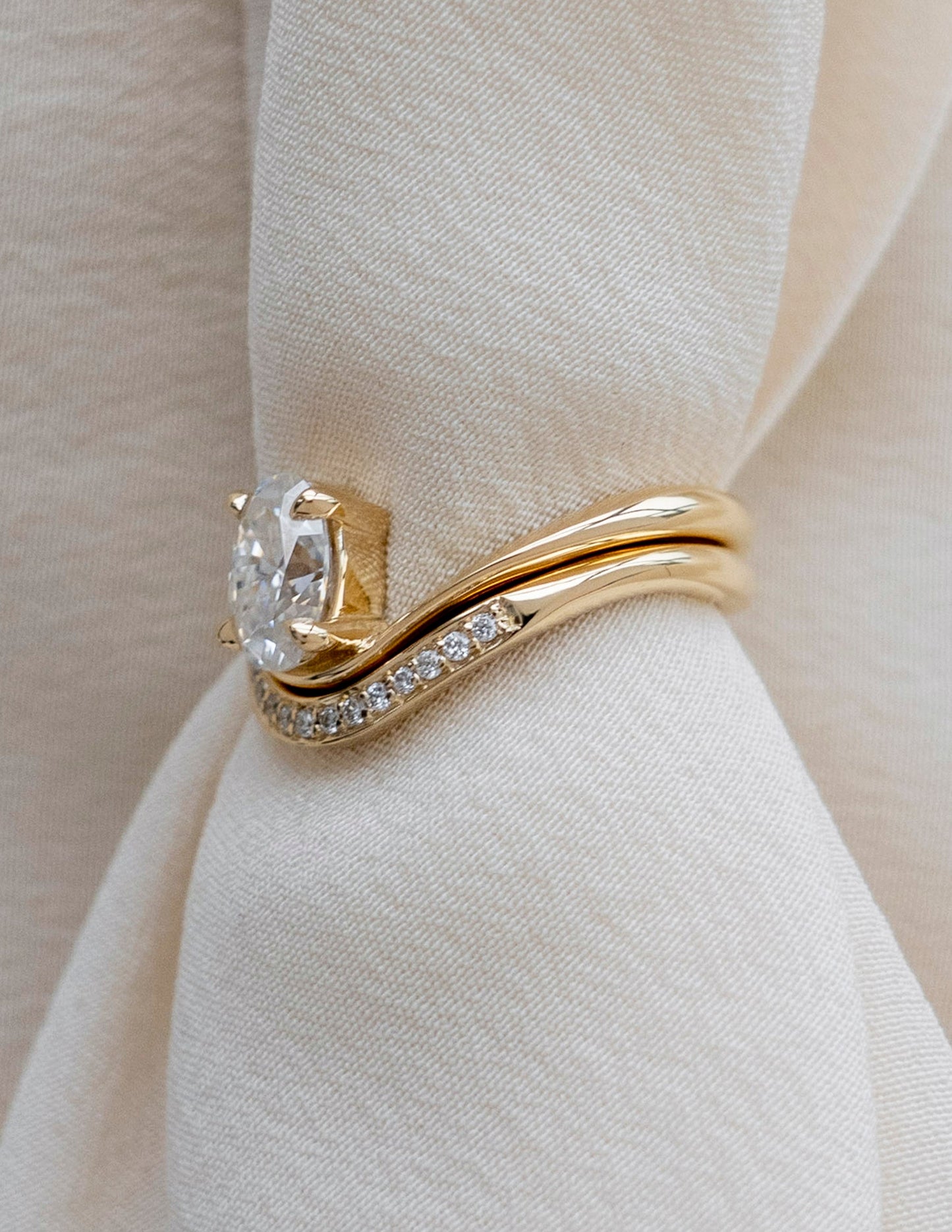 1 CT Oval Cut Solitaire Moissanite Ring With Sunrise Styled Wedding Band