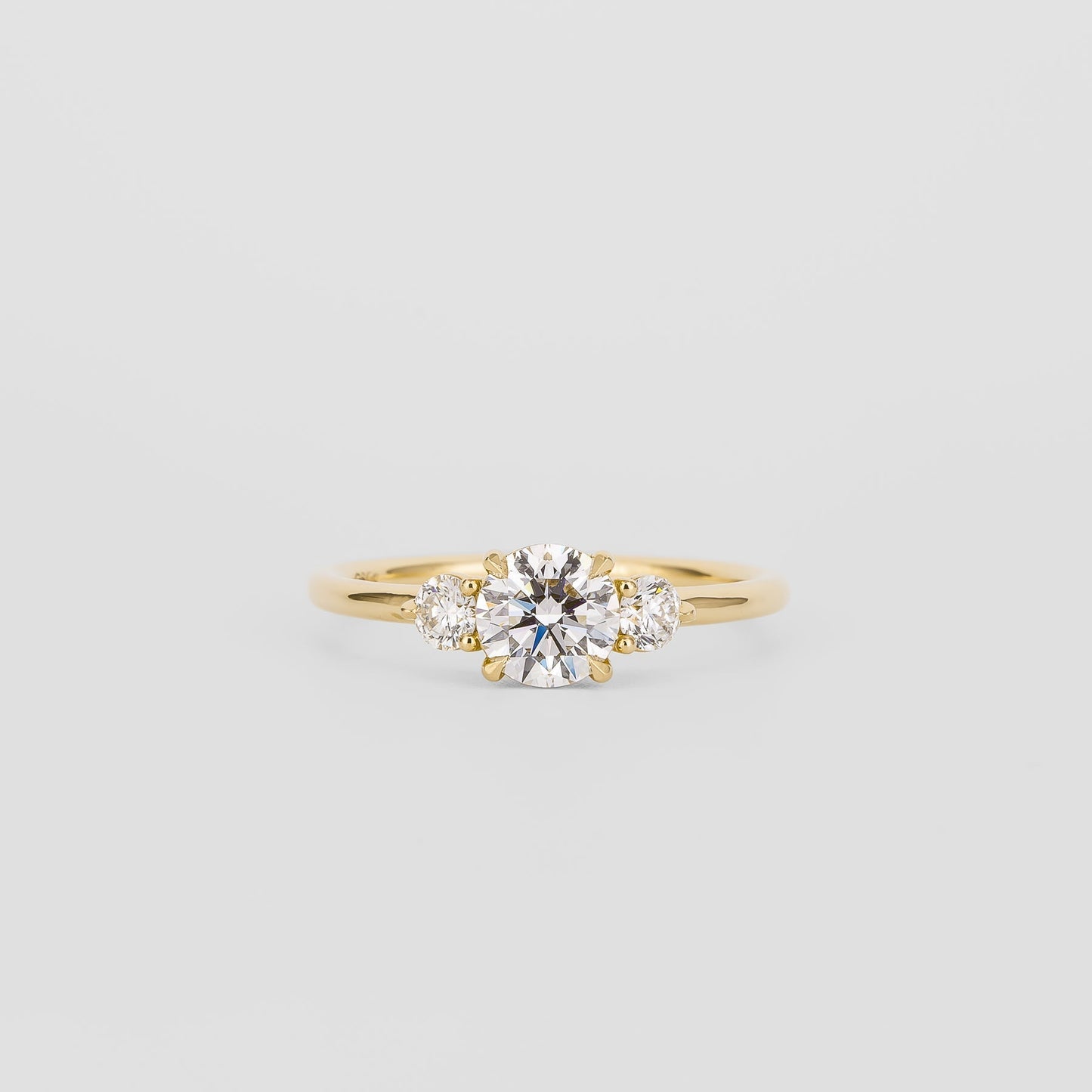 0.72 CT Round Shaped Three Stone Moissanite Engagement Ring