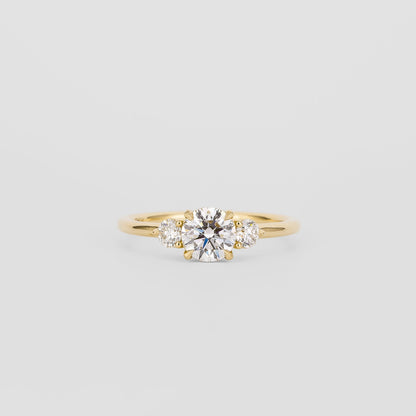 0.72 CT Round Shaped Three Stone Moissanite Engagement Ring