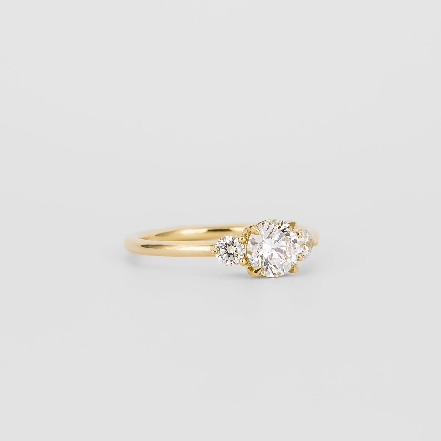 0.72 CT Round Shaped Three Stone Moissanite Engagement Ring