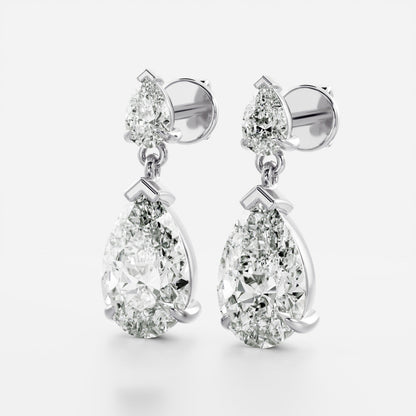 1.2 TCW Pear Cut Moissanite Dangles Earrings in Gold