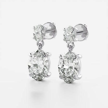 1.2 TCW Oval Cut Moissanite Dangles Earrings in Gold