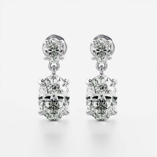 1.2 TCW Oval Cut Moissanite Dangles Earrings in Gold