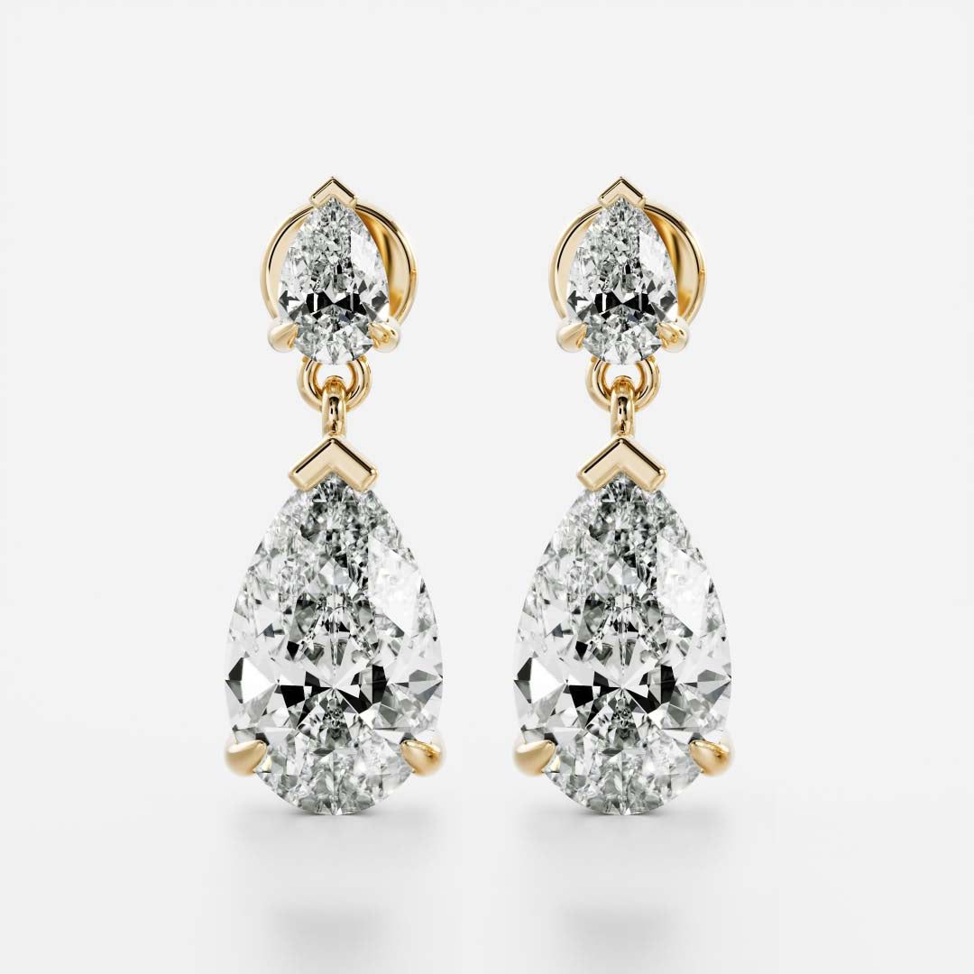 1.2 TCW Pear Cut Moissanite Dangles Earrings in Gold