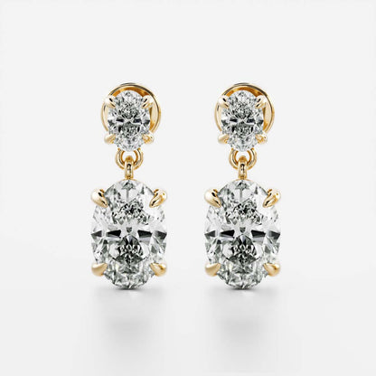 1.2 TCW Oval Cut Moissanite Dangles Earrings in Gold