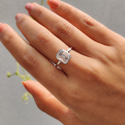 Emerald Engagement Ring With Bezel Setting