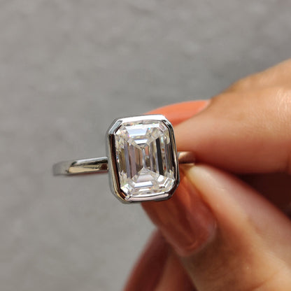 Emerald Engagement Ring With Bezel Setting