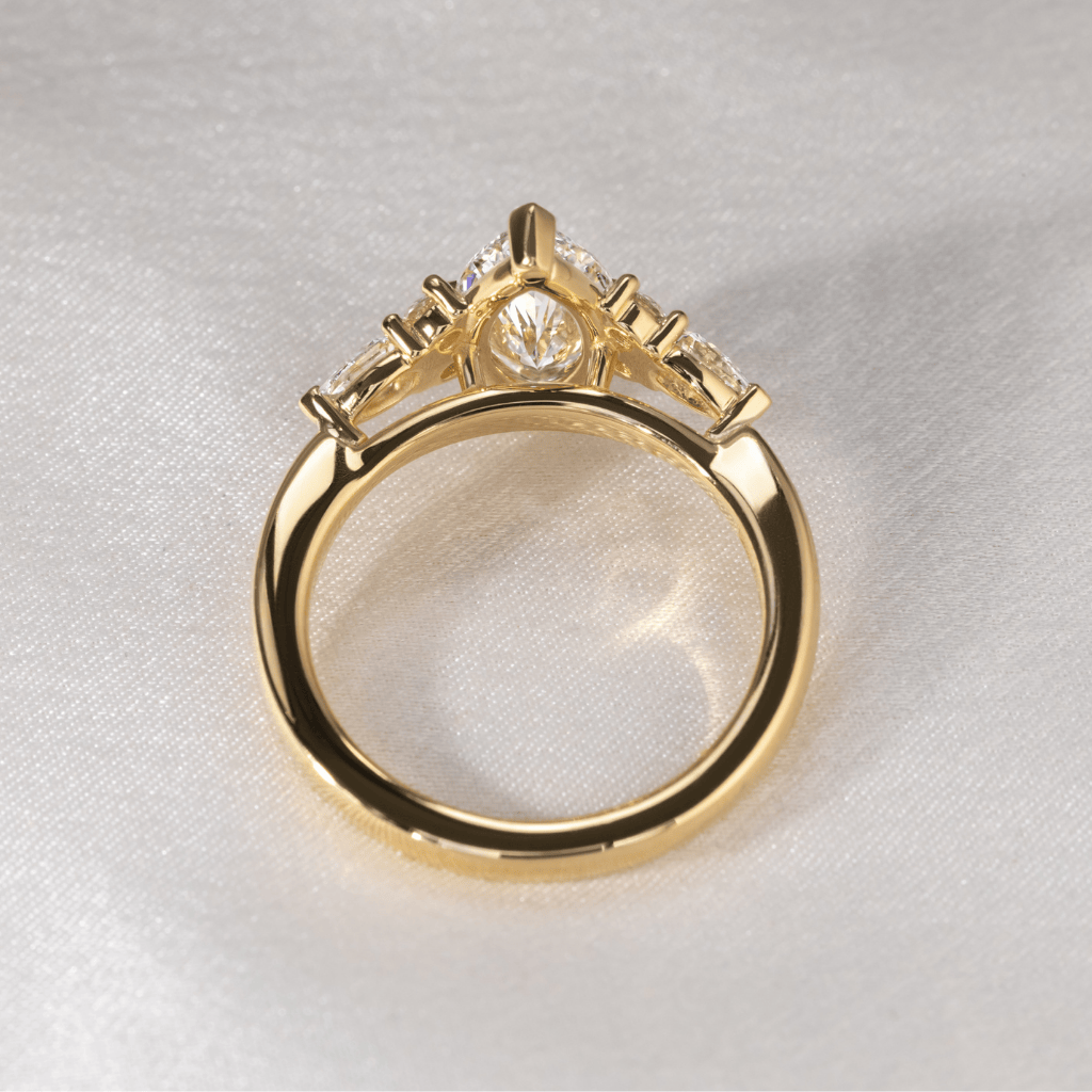 Marquise Shaped Three Stone Lab Grown Diamond Engagement Ring