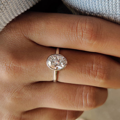 Oval Bezel Engagement Ring In White Gold