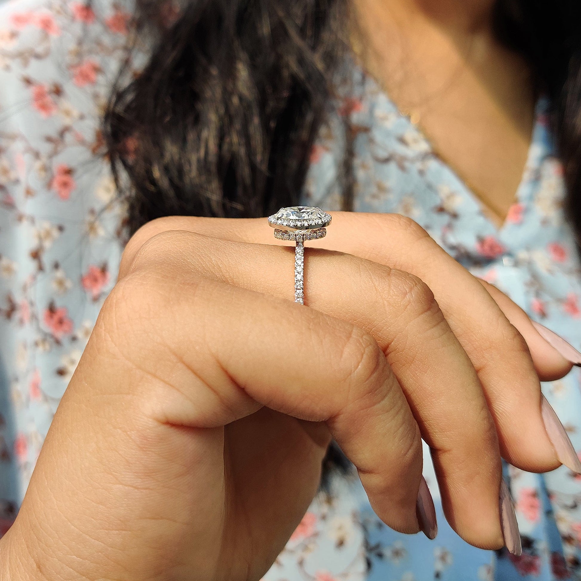 Oval Cut Hidden Halo Engagement Ring In White Gold