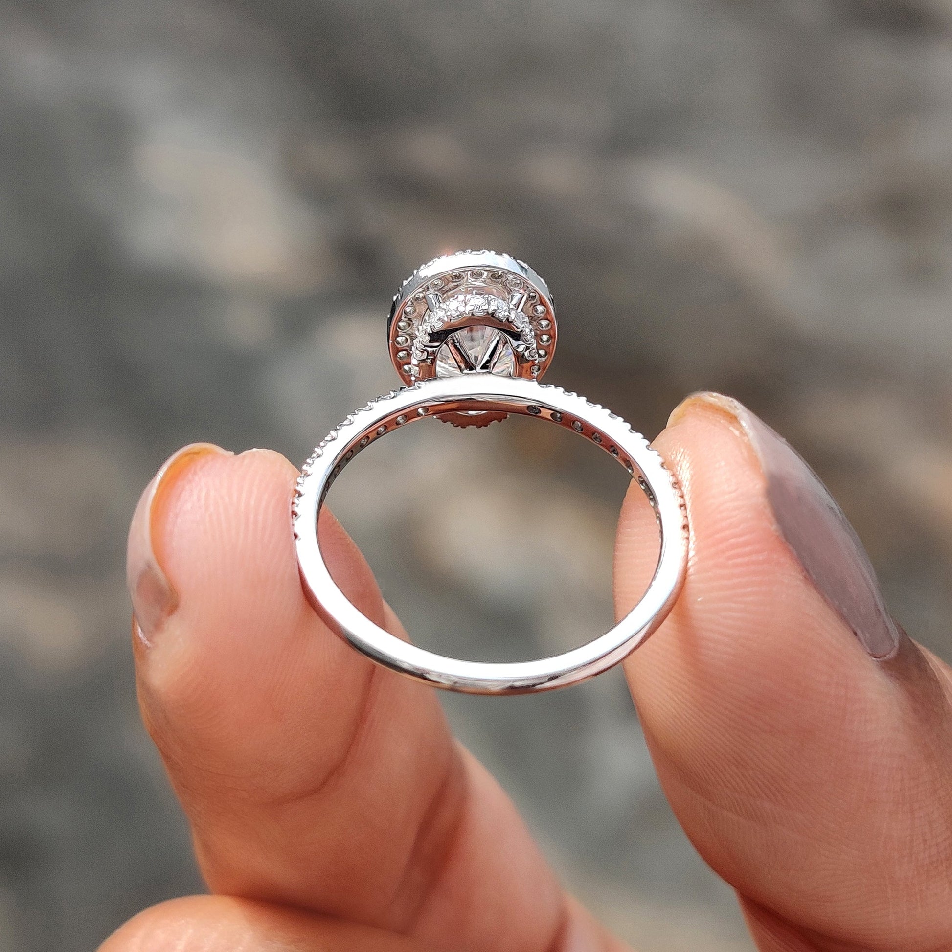 Oval Cut Hidden Halo Engagement Ring In White Gold