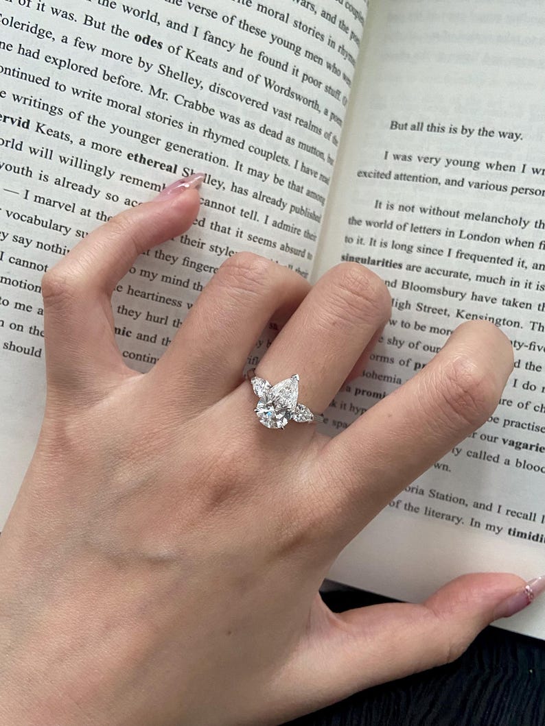 Marquise Shaped Three Stone Lab Grown Diamond Engagement Ring