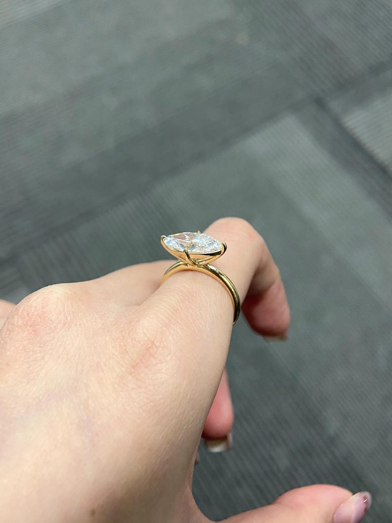 Marquise Shaped Three Stone Lab Grown Diamond Engagement Ring