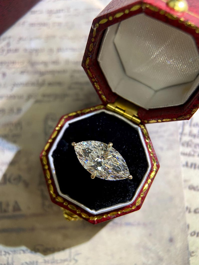 Marquise Shaped Three Stone Lab Grown Diamond Engagement Ring