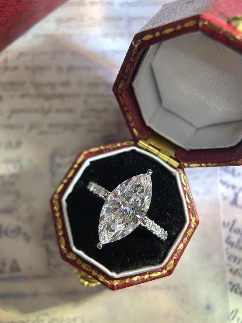 Marquise Shaped Three Stone Lab Grown Diamond Engagement Ring