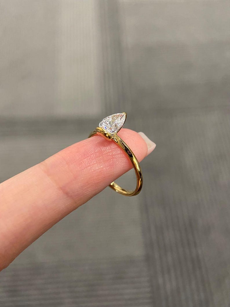 Marquise Shaped Three Stone Lab Grown Diamond Engagement Ring