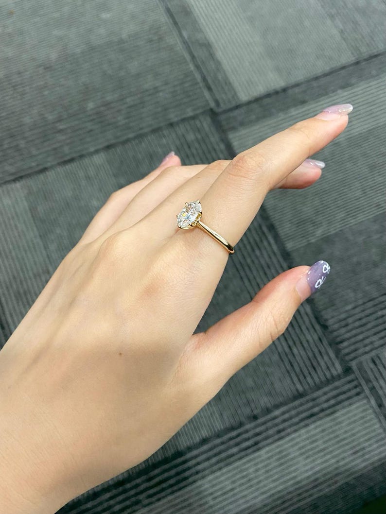 Marquise Shaped Three Stone Lab Grown Diamond Engagement Ring