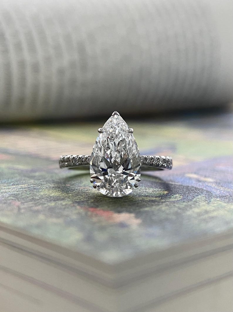 Marquise Shaped Three Stone Lab Grown Diamond Engagement Ring