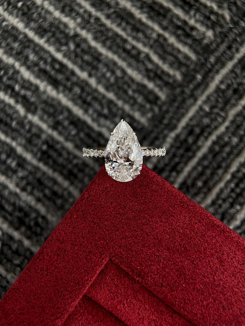 Marquise Shaped Three Stone Lab Grown Diamond Engagement Ring