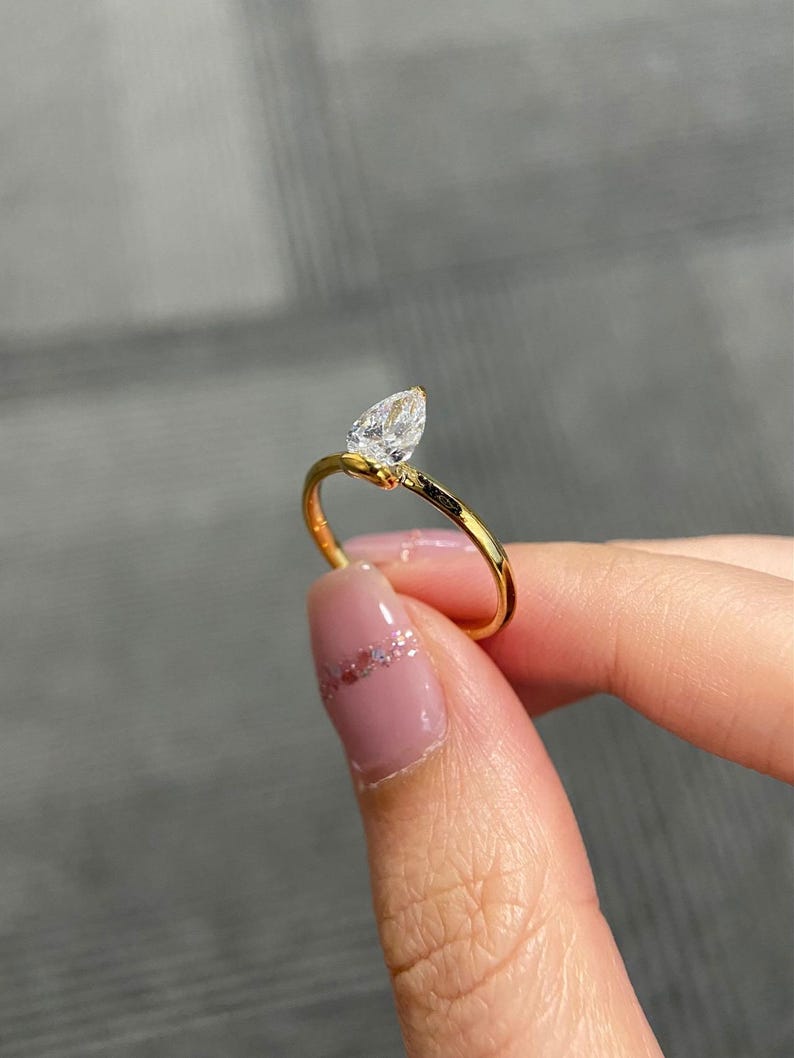 Marquise Shaped Three Stone Lab Grown Diamond Engagement Ring