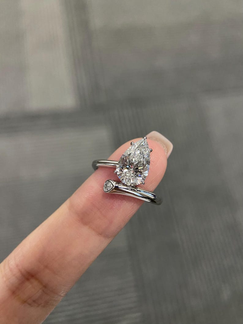 Marquise Shaped Three Stone Lab Grown Diamond Engagement Ring