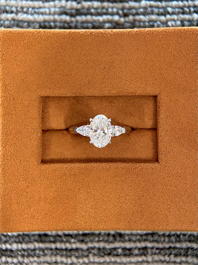 Marquise Shaped Three Stone Lab Grown Diamond Engagement Ring