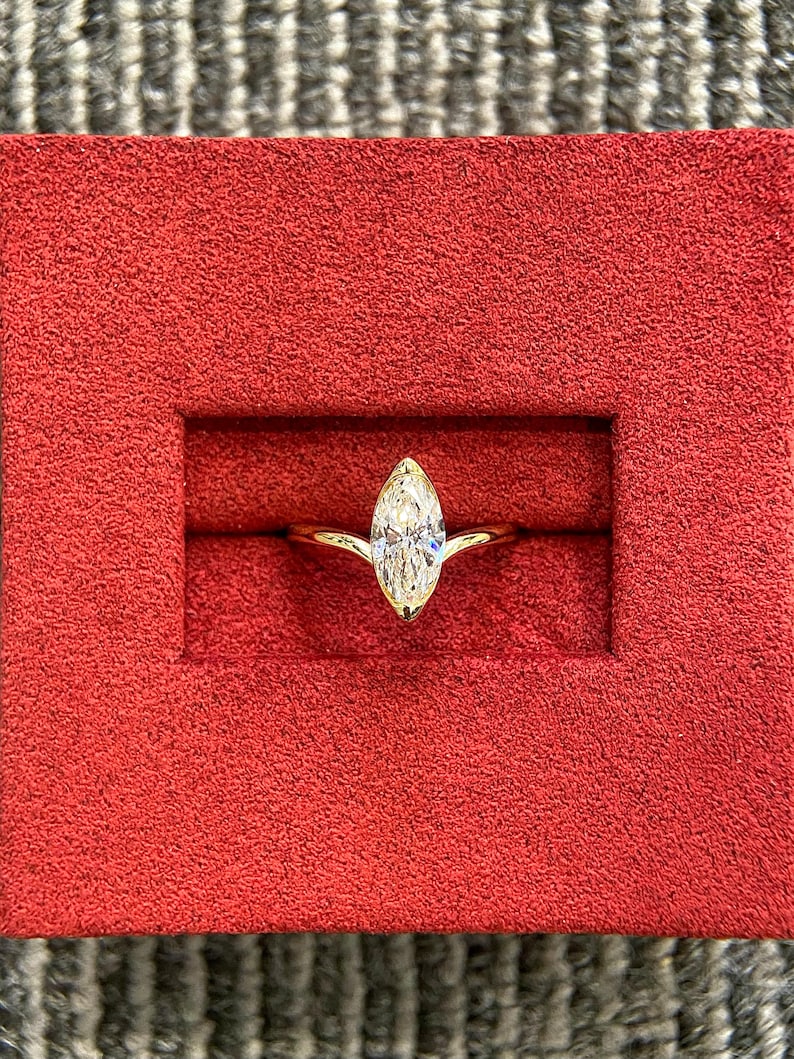 Marquise Shaped Three Stone Lab Grown Diamond Engagement Ring