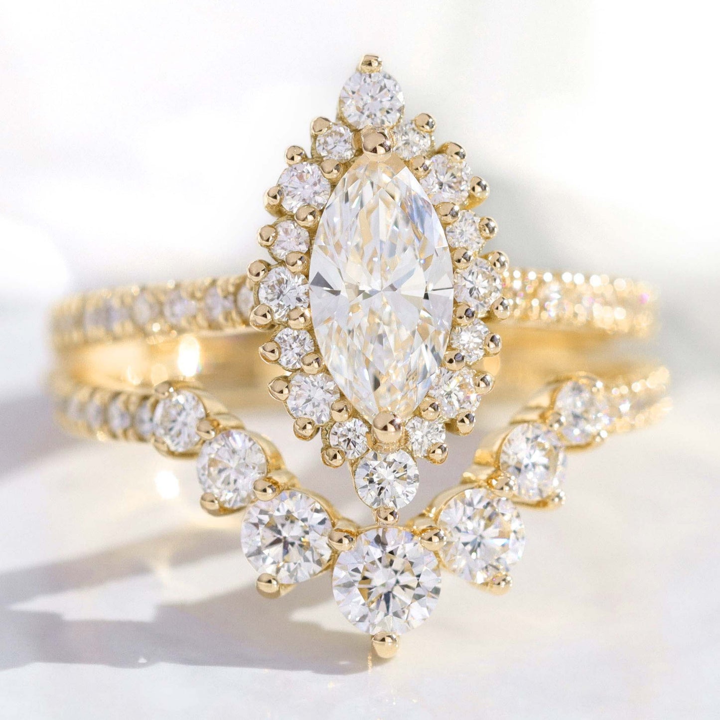 0.7 CT Marquise Cut Curved Pave Moissanite Bridal Ring Set