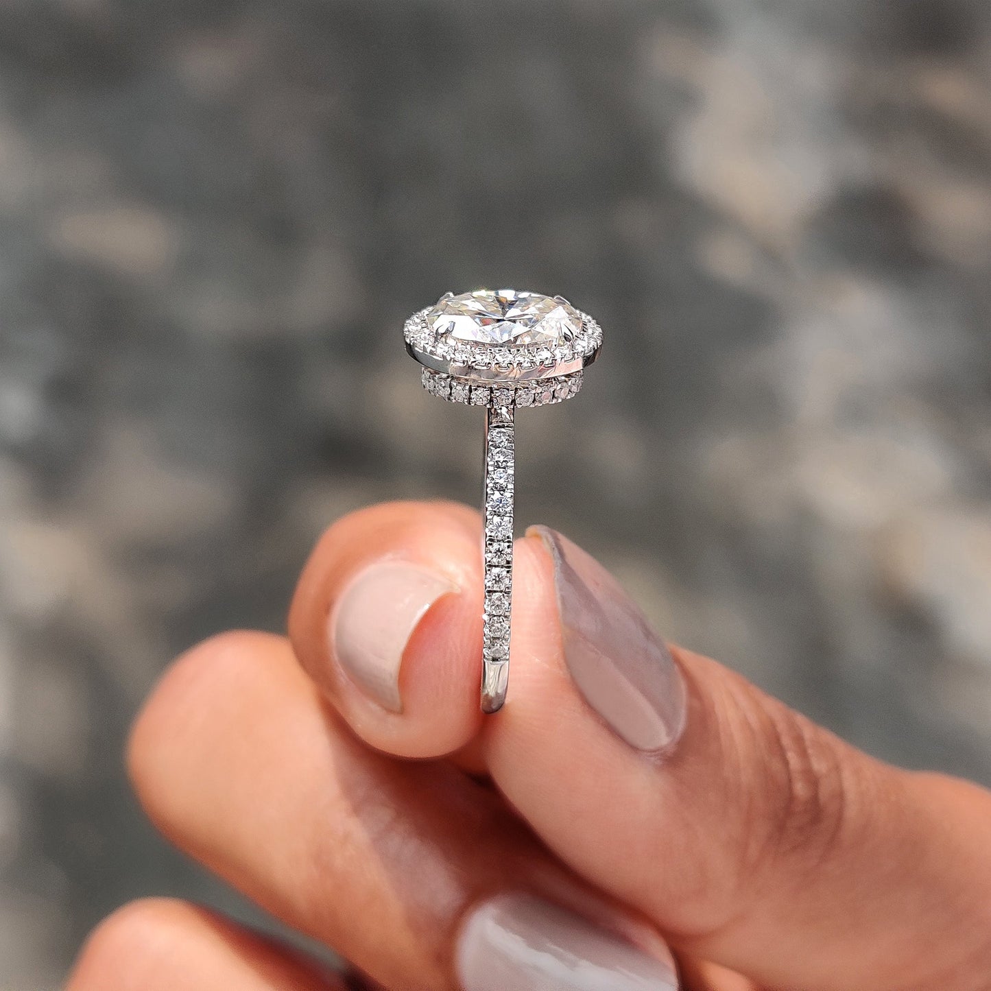 Oval Cut Hidden Halo Engagement Ring In White Gold